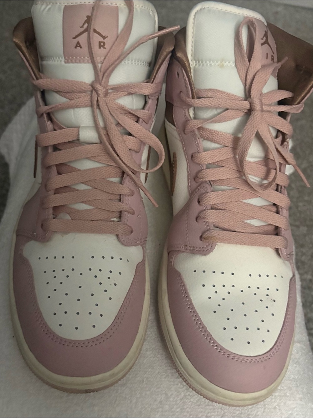 Jordan Women’s High-Top Sneakers in Blush Pink and White